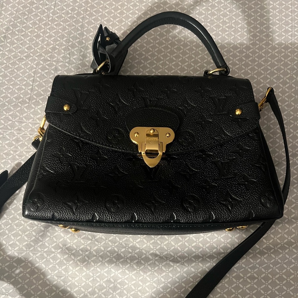 Authentic Louis Vuitton Shoulder Bag , without tags .